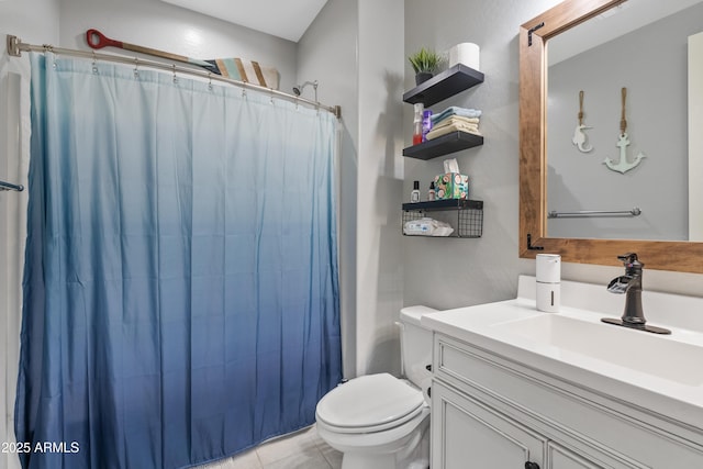 bathroom with tile patterned flooring, vanity, curtained shower, and toilet