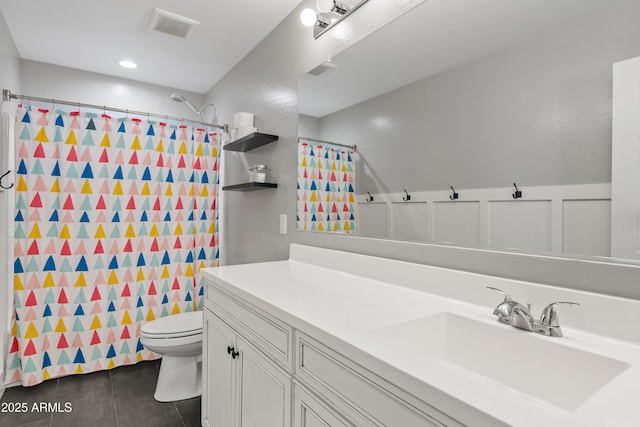 bathroom with vanity, tile patterned flooring, a shower with curtain, and toilet