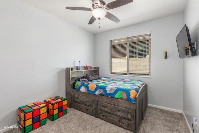 bedroom with baseboards, carpet flooring, and a ceiling fan