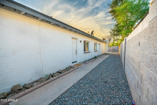 view of property exterior at dusk