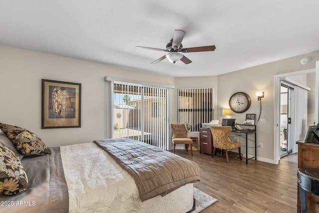 bedroom with ceiling fan, baseboards, access to outside, and wood finished floors