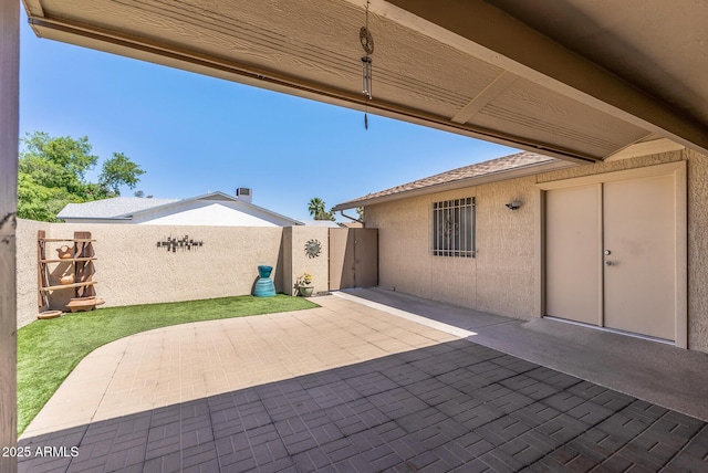 view of patio featuring a fenced backyard