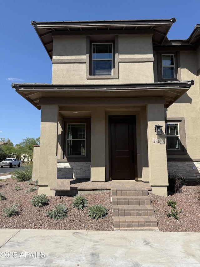 2815 N Claire Dr, Buckeye, AZ 85396 - prairie-style home featuring stucco siding and a porch