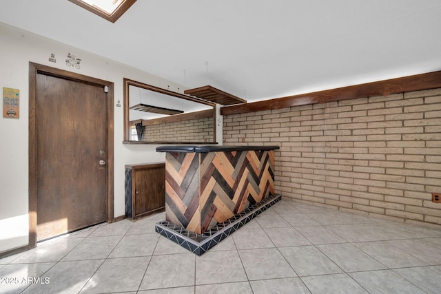 6217 W Orange Dr, Glendale, AZ 85301 - wine cellar with brick wall and light tile patterned floors