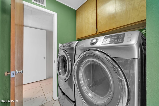 6217 W Orange Dr, Glendale, AZ 85301 - laundry room with independent washer and dryer and cabinet space