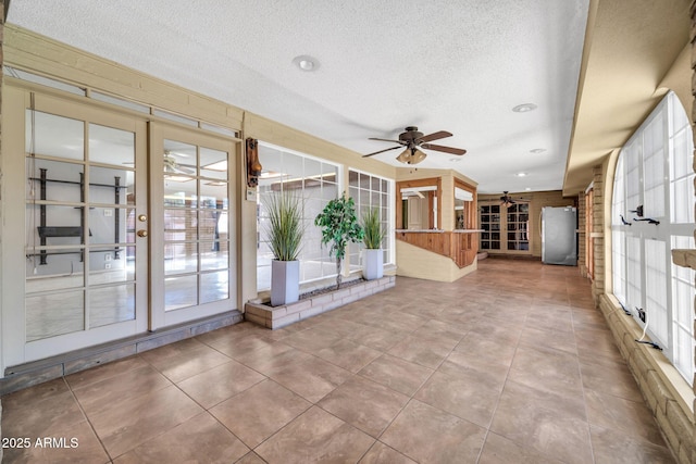 6217 W Orange Dr, Glendale, AZ 85301 - unfurnished sunroom featuring french doors