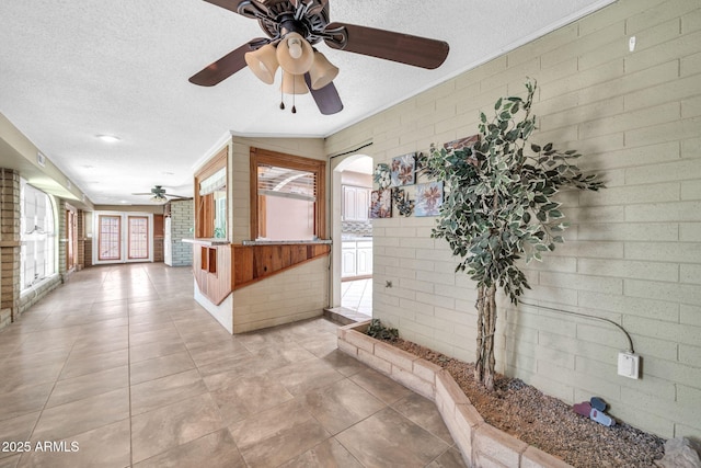 6217 W Orange Dr, Glendale, AZ 85301 - unfurnished sunroom with french doors, plenty of natural light, and arched walkways