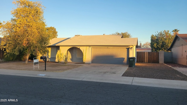 single story home with a garage