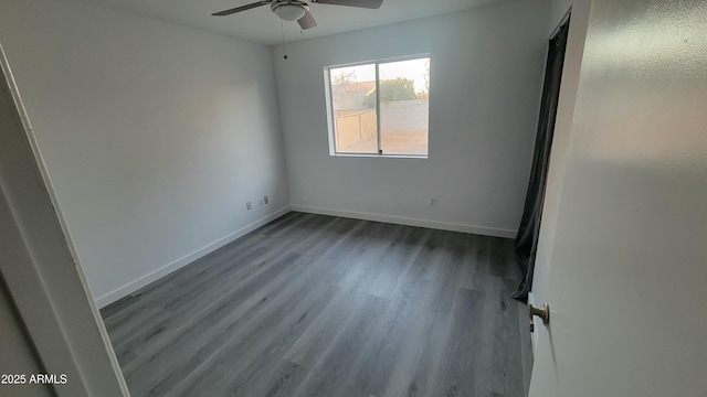 empty room featuring ceiling fan and hardwood / wood-style flooring