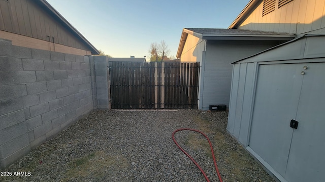 exterior space featuring a storage unit