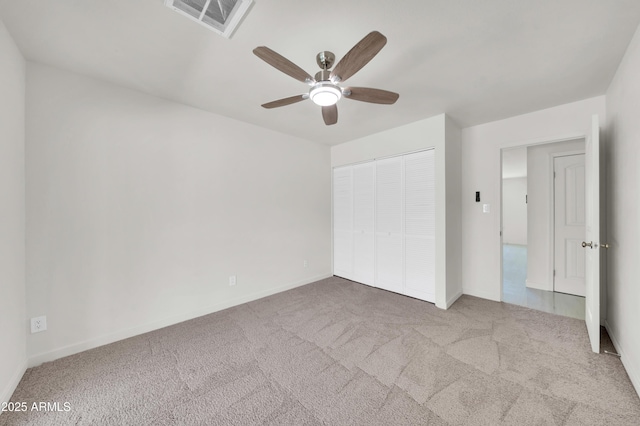 8146 N 17th Dr, Phoenix, AZ 85021 - unfurnished bedroom with carpet, a closet, baseboards, and ceiling fan