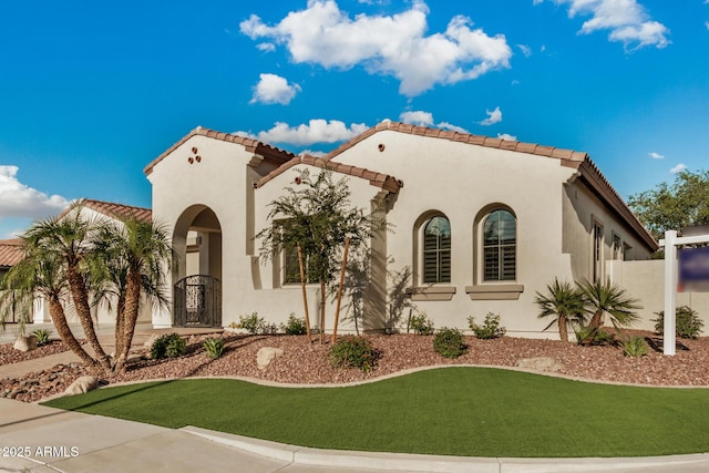 4453 S Huachuca Way, Chandler, AZ 85249 - mediterranean / spanish house with a tile roof and stucco siding