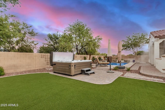 4453 S Huachuca Way, Chandler, AZ 85249 - fenced backyard with a hot tub and a patio area