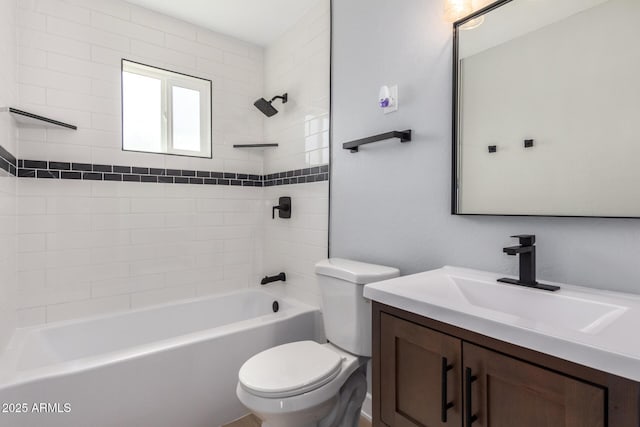 bathroom featuring shower / bathing tub combination, toilet, and vanity