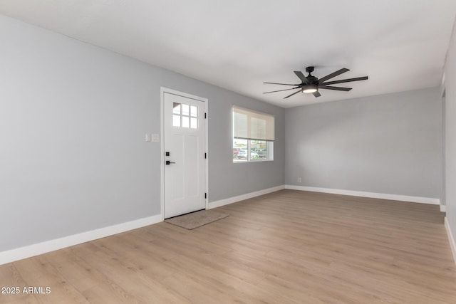 entrance foyer featuring light wood-style floors, baseboards, and ceiling fan