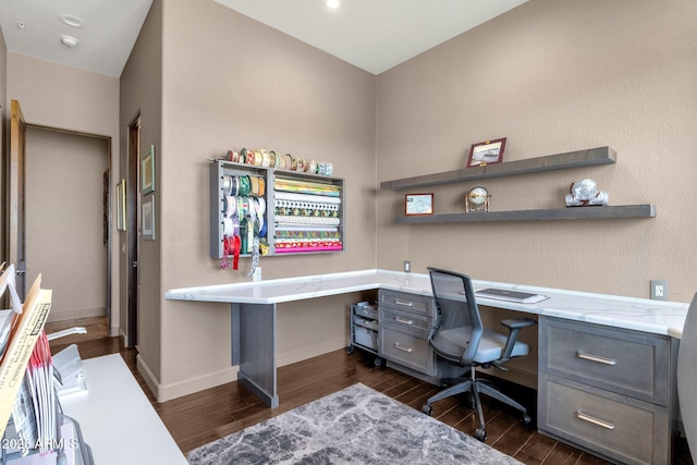 office area featuring dark wood finished floors and baseboards
