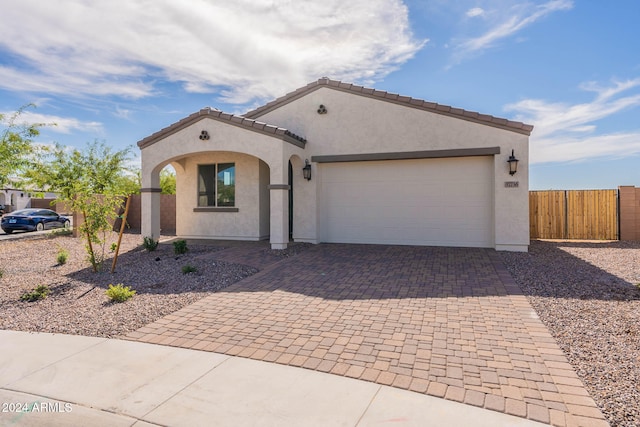 view of front of home with a garage