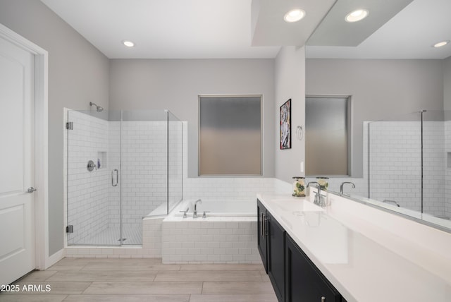 22421 N 34th St, Phoenix, AZ 85050 - bathroom featuring a bath, vanity, recessed lighting, and a shower stall