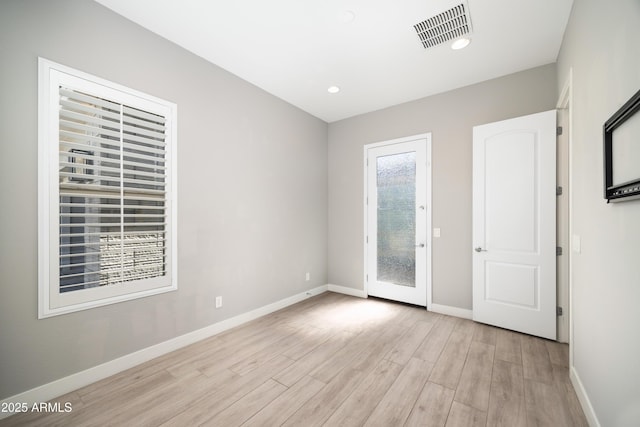 22421 N 34th St, Phoenix, AZ 85050 - empty room with light wood finished floors, baseboards, visible vents, and recessed lighting