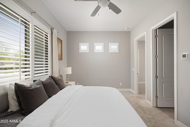 22421 N 34th St, Phoenix, AZ 85050 - bedroom featuring baseboards, ceiling fan, and light carpet