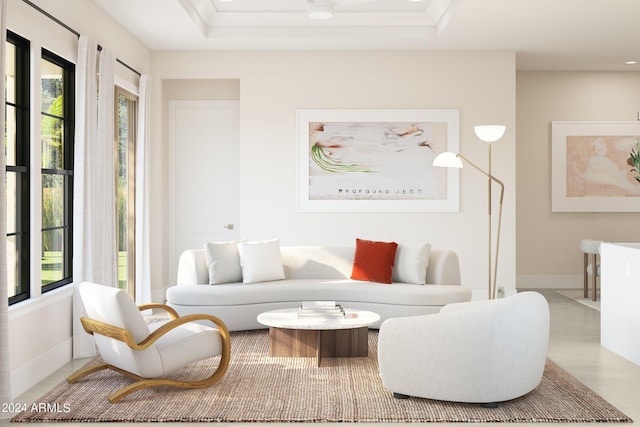 living room with ornamental molding, a wealth of natural light, light hardwood / wood-style floors, and a raised ceiling