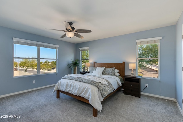 bedroom featuring ceiling fan and carpet floors