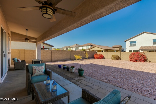 view of patio with an outdoor hangout area and ceiling fan