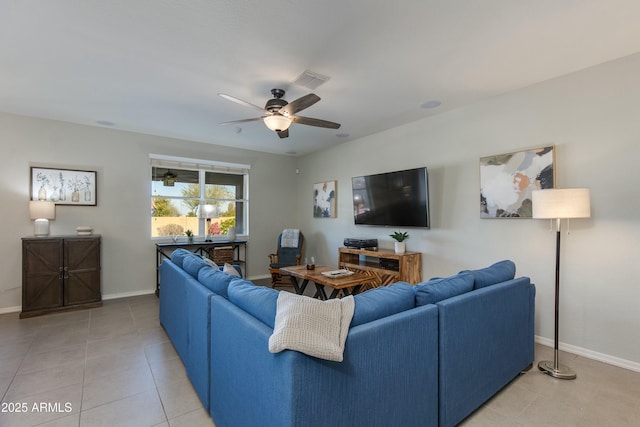 living room with tile patterned floors and ceiling fan