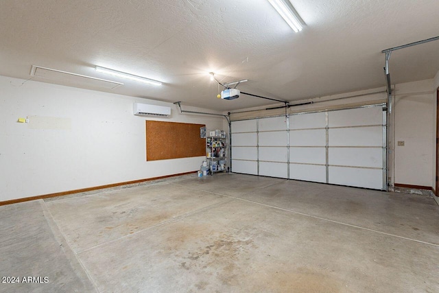 garage featuring a garage door opener and an AC wall unit