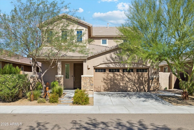 view of front of property featuring a garage