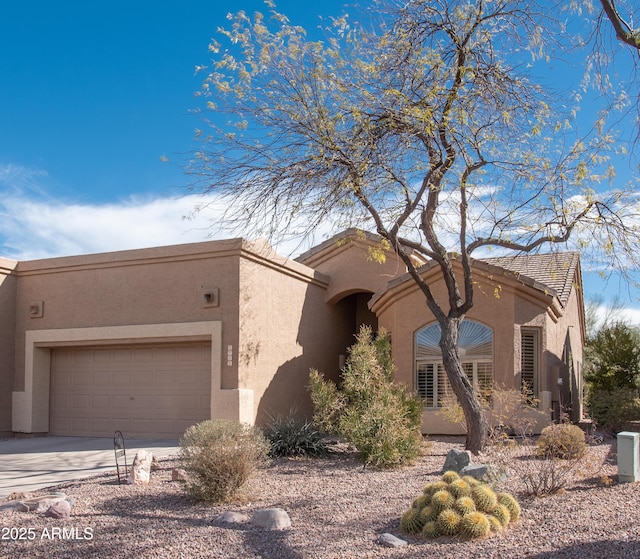 southwest-style home with a garage