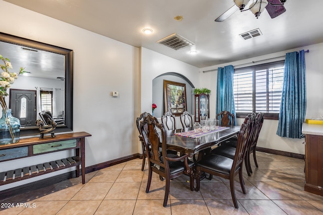 dining room featuring a wealth of natural light and light tile patterned floors