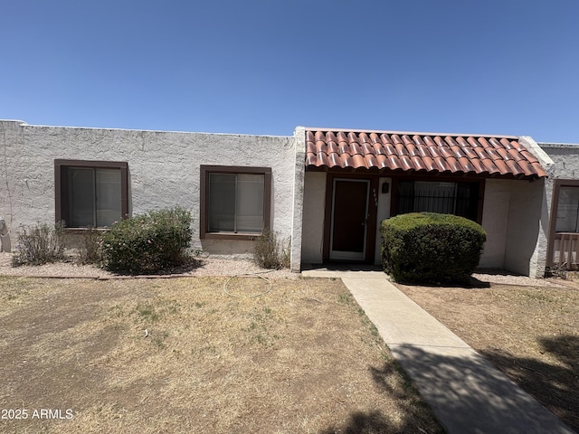 6605 N 46th Ln, Glendale, AZ 85301 - view of front facade featuring a tile roof and stucco siding