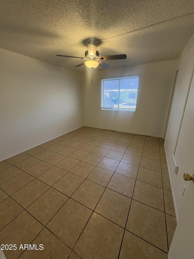 6605 N 46th Ln, Glendale, AZ 85301 - unfurnished room featuring a textured ceiling, light tile patterned floors, and a ceiling fan