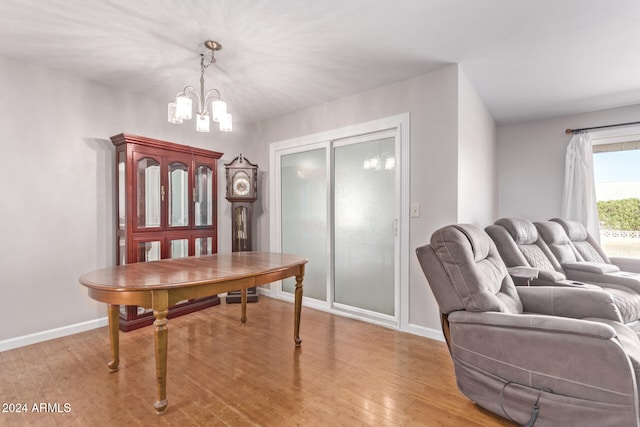 dining room featuring a chandelier and light hardwood / wood-style floors