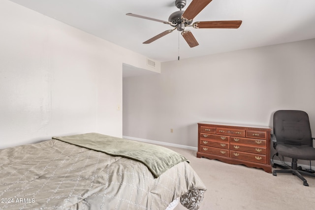 bedroom featuring ceiling fan and light colored carpet