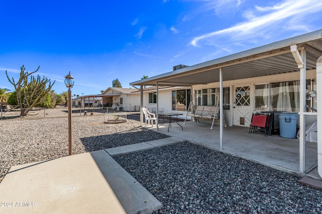 exterior space with a patio area