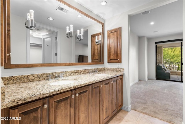 bathroom with vanity and tile patterned floors