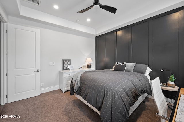 10448 E Glencove St, Mesa, AZ 85207 - bedroom with a raised ceiling, dark carpet, recessed lighting, baseboards, and visible vents
