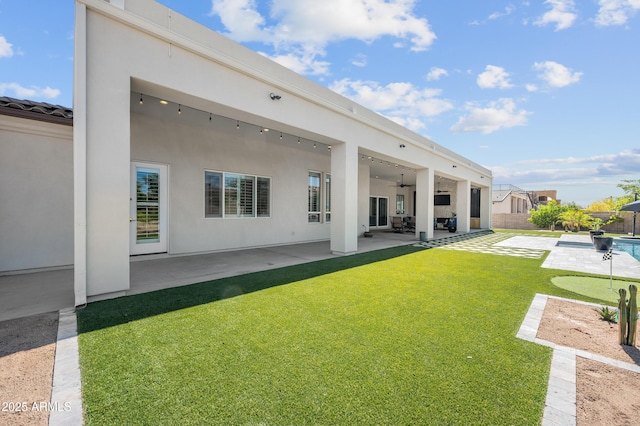 10448 E Glencove St, Mesa, AZ 85207 - rear view of house featuring fence private yard, ceiling fan, and a patio area