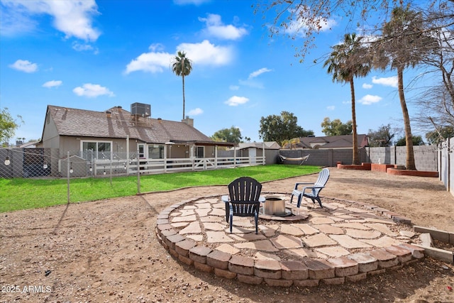 view of yard with a fire pit and a patio area