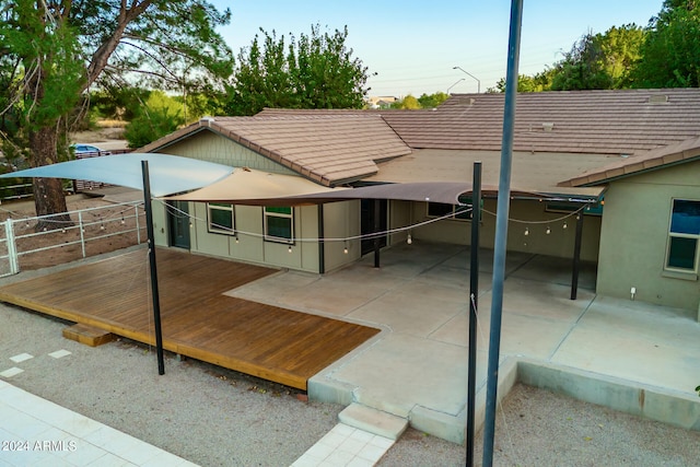 rear view of house with a patio