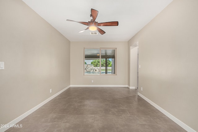 spare room featuring ceiling fan