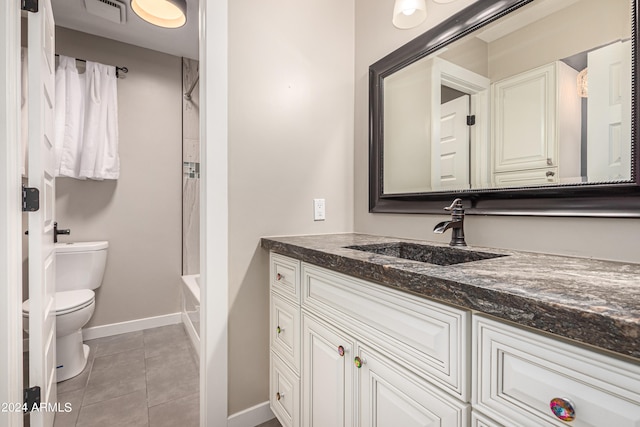 full bathroom with shower / washtub combination, tile patterned flooring, vanity, and toilet