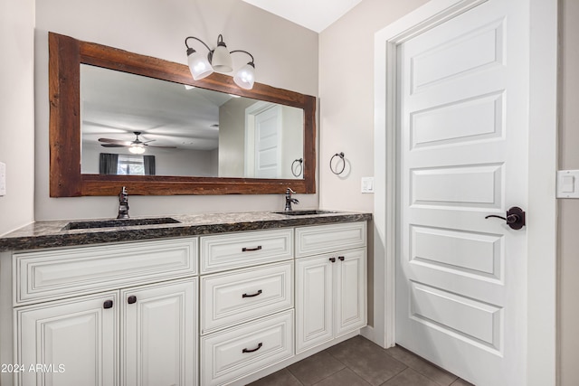 bathroom featuring vanity, tile patterned floors, and ceiling fan