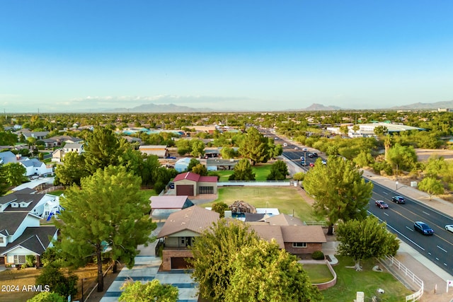 birds eye view of property featuring a mountain view