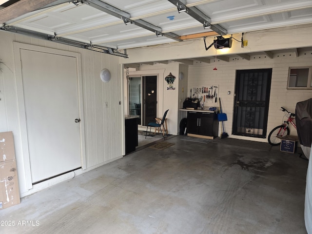 garage featuring a garage door opener