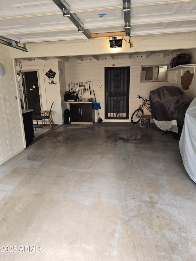 garage featuring a garage door opener