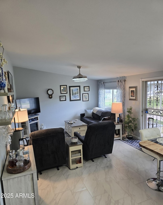 living area with marble finish floor