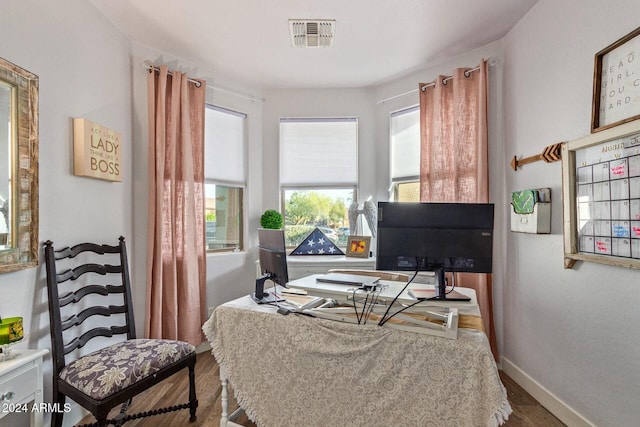 home office featuring hardwood / wood-style floors